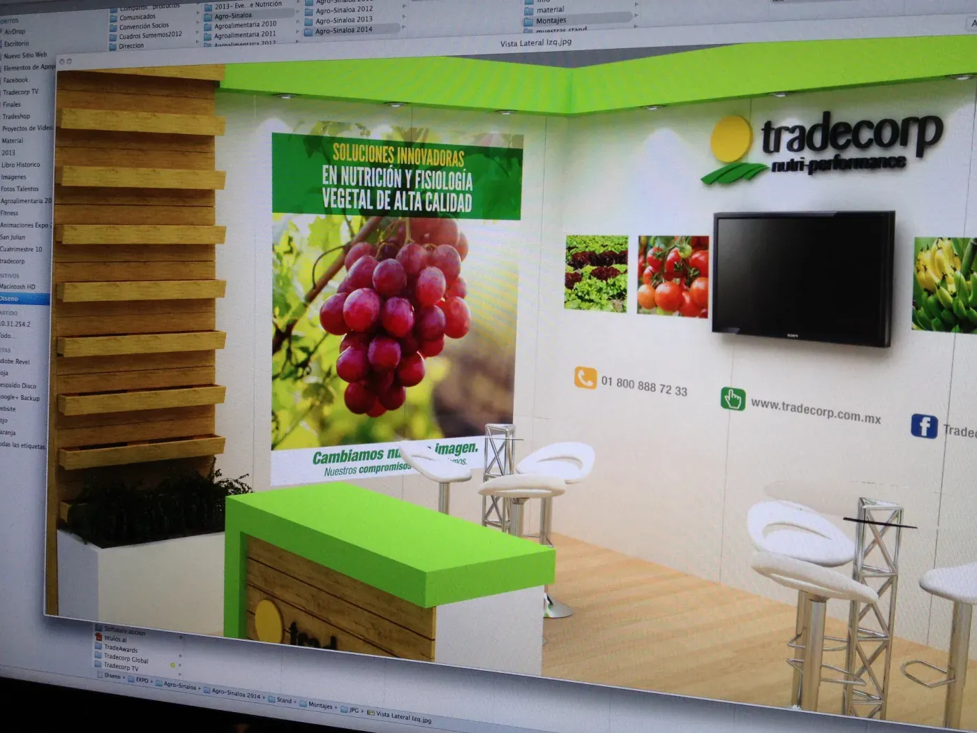 A 3D render of a Tradecorp exhibition stand on screen.