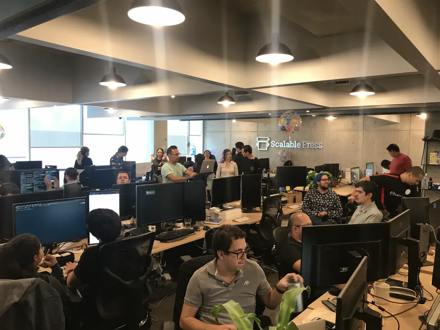 The Scalable Press engineering floor on a working day.
